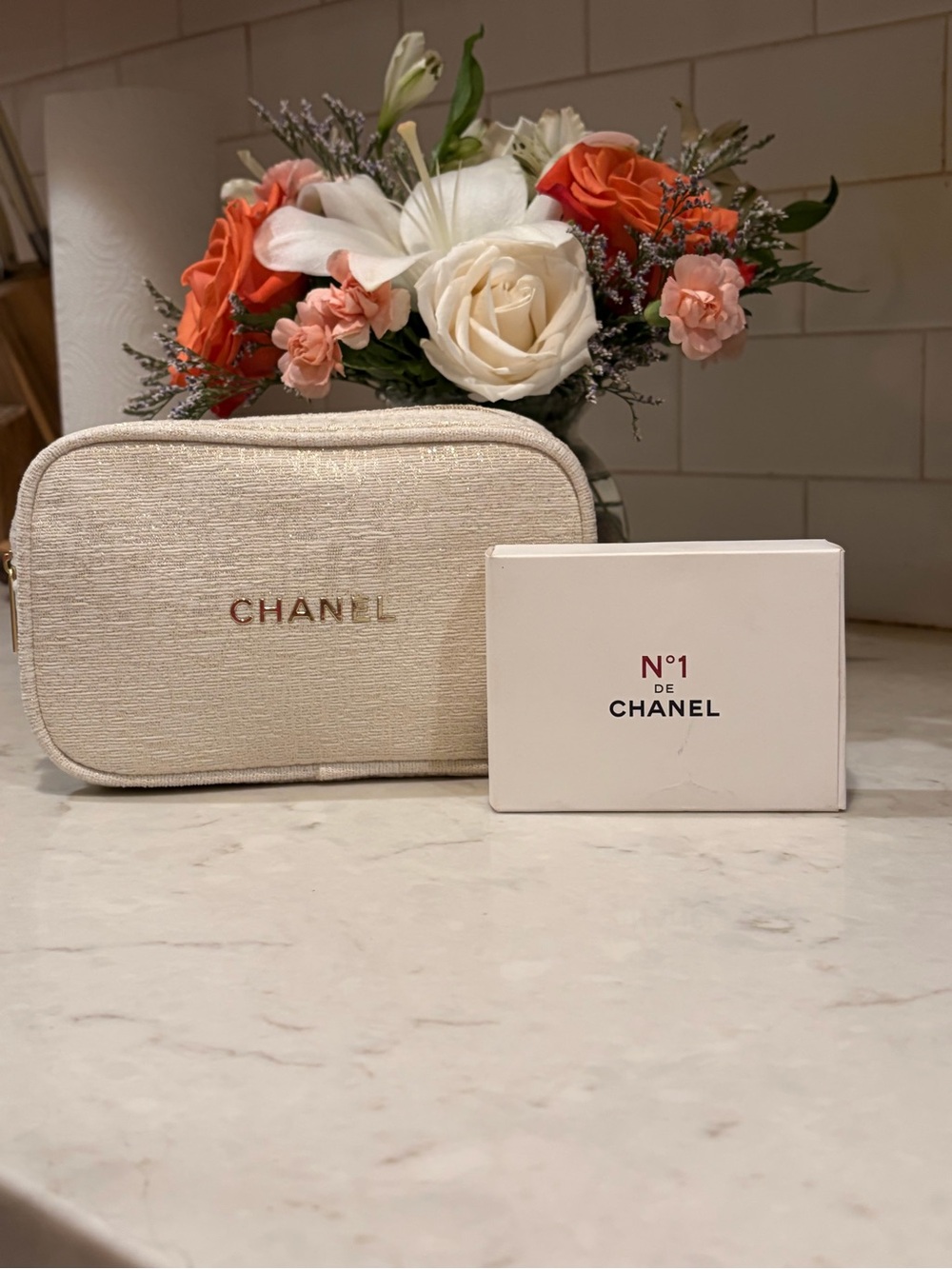 CHANEL Cream Textured Cosmetic Pouch with Gold Logo
